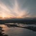 Captivating sunrise view over Seongsan, Jeju Island with striking seascape and clouds.